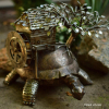 Turtle with mill ant tree on shield metal sculpture